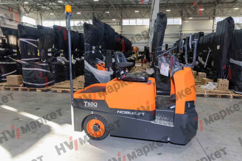 Самоходный Тягач для склада/производства Noblelift T60Q 6000kg (Литий 200Ач + 100Ач, blue light and rearview mirror, walkie mode button, optional Controller Curtis F4A and display, Seat armrest), грузоподъемность 6000 кг, тип питания АКБ, напряжение 48 В